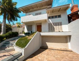 Sobrado com 413m², 4 dormitórios no bairro Marechal Rondon em Canoas para Comprar